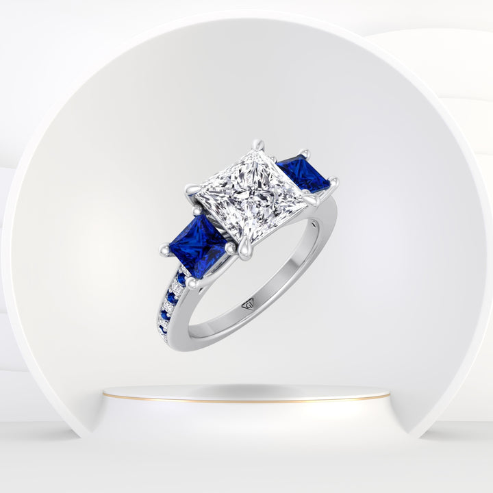 Sarno - (3.20Ct T.W.) Princess Cut Diamond Engagement Ring with Blue Sapphire Sidestones - Gem Jewelers Co