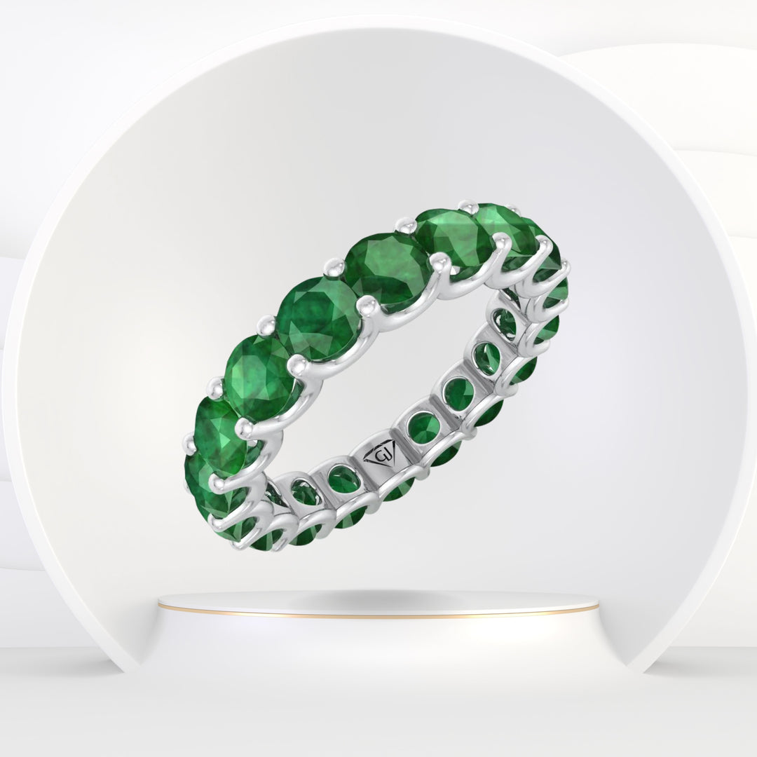 May - 4 Carat Round Emerald Eternity Band - Gem Jewelers Co
