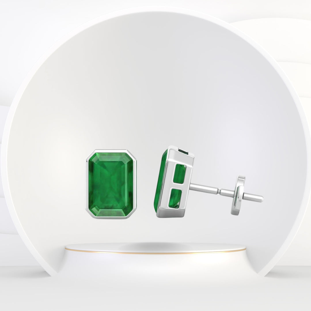 Chia - Emerald Cut Emerald Bezel Set Earrings - Gem Jewelers Co
