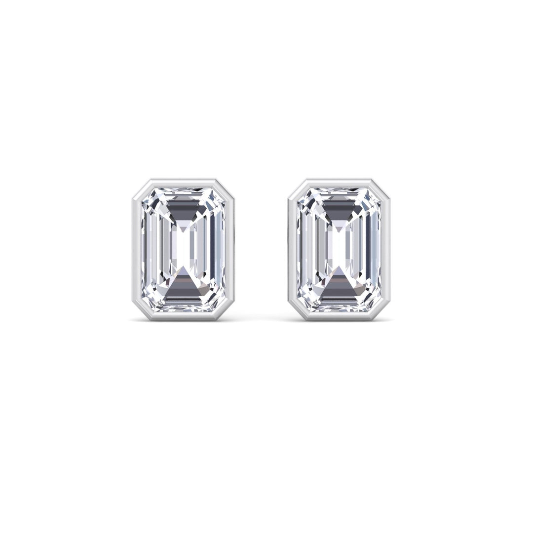 Cheza - Bezel Set Emerald Shape Diamond Studs - Gem Jewelers Co