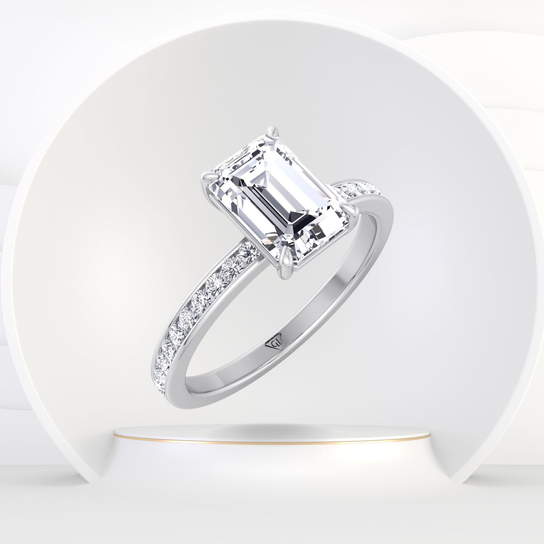 Ferizia - Emerald Shape Diamond Engagement Ring with Channel Set Band - Gem Jewelers Co