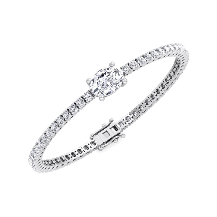 oval-cut-center-stone-diamond-tennis-bracelet-in-solid-white-gold