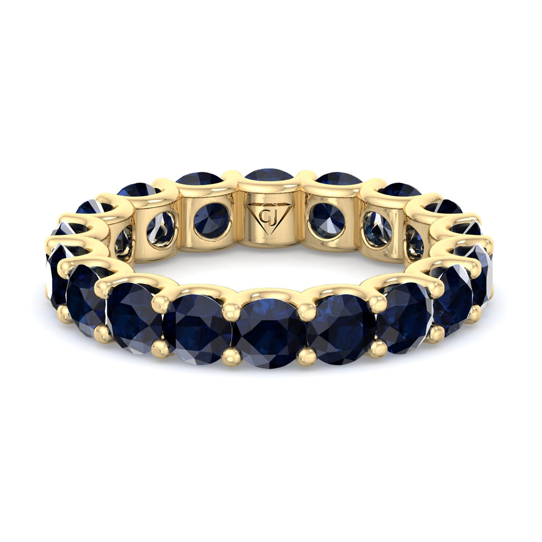 prong-setting-round-cut-blue-sapphire-eternity-band-in-solid-yellow-gold