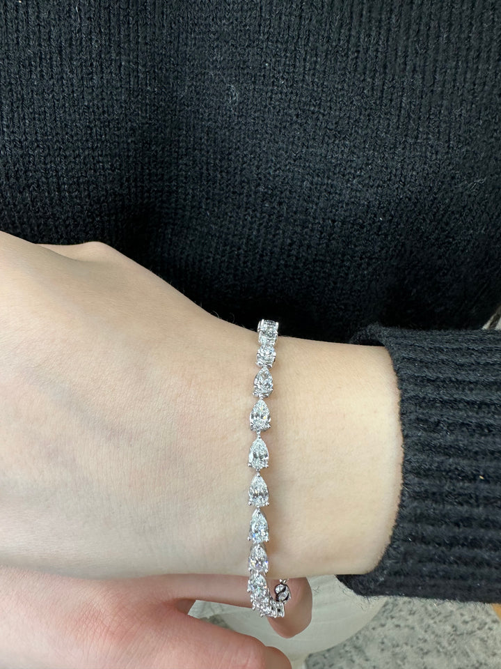 pear-shape-east-to-west-diamond-tennis-bracelet-14k-white-gold