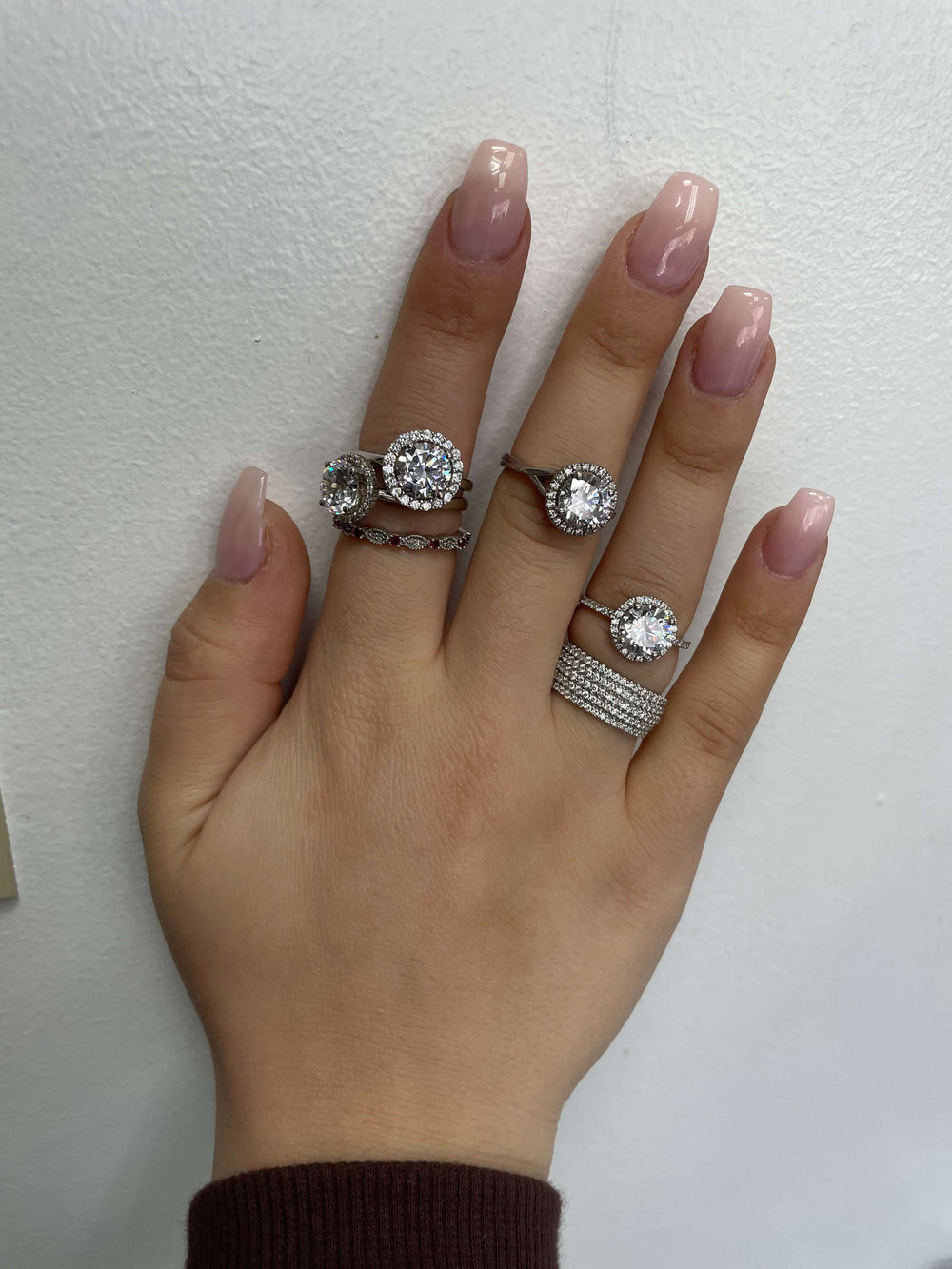 round-cut-diamond-with-halo-engagement-rings-14k-white-gold-and-diamond-eternity-bands