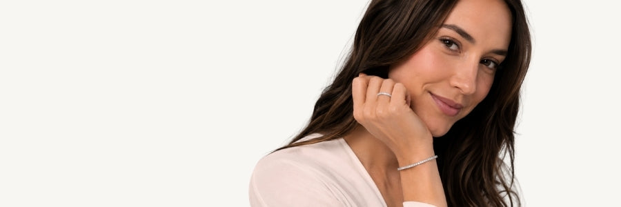 Natural diamond tennis bracelet worn on wrist in 14K solid gold - Gem Jewelers Co.