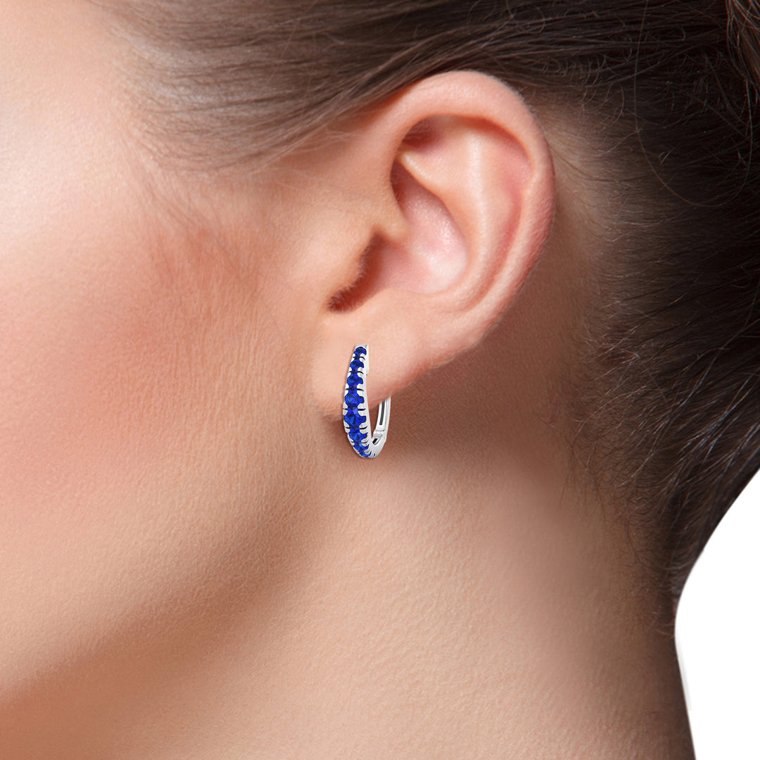 Natural Blue Sapphire Graduated Round Shape Huggie Hoop Earrings lifestyle WG