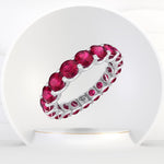 July - Round Cut Red Ruby Eternity Band - Gem Jewelers Co