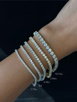 4-prong diamond tennis bracelet with square box setting