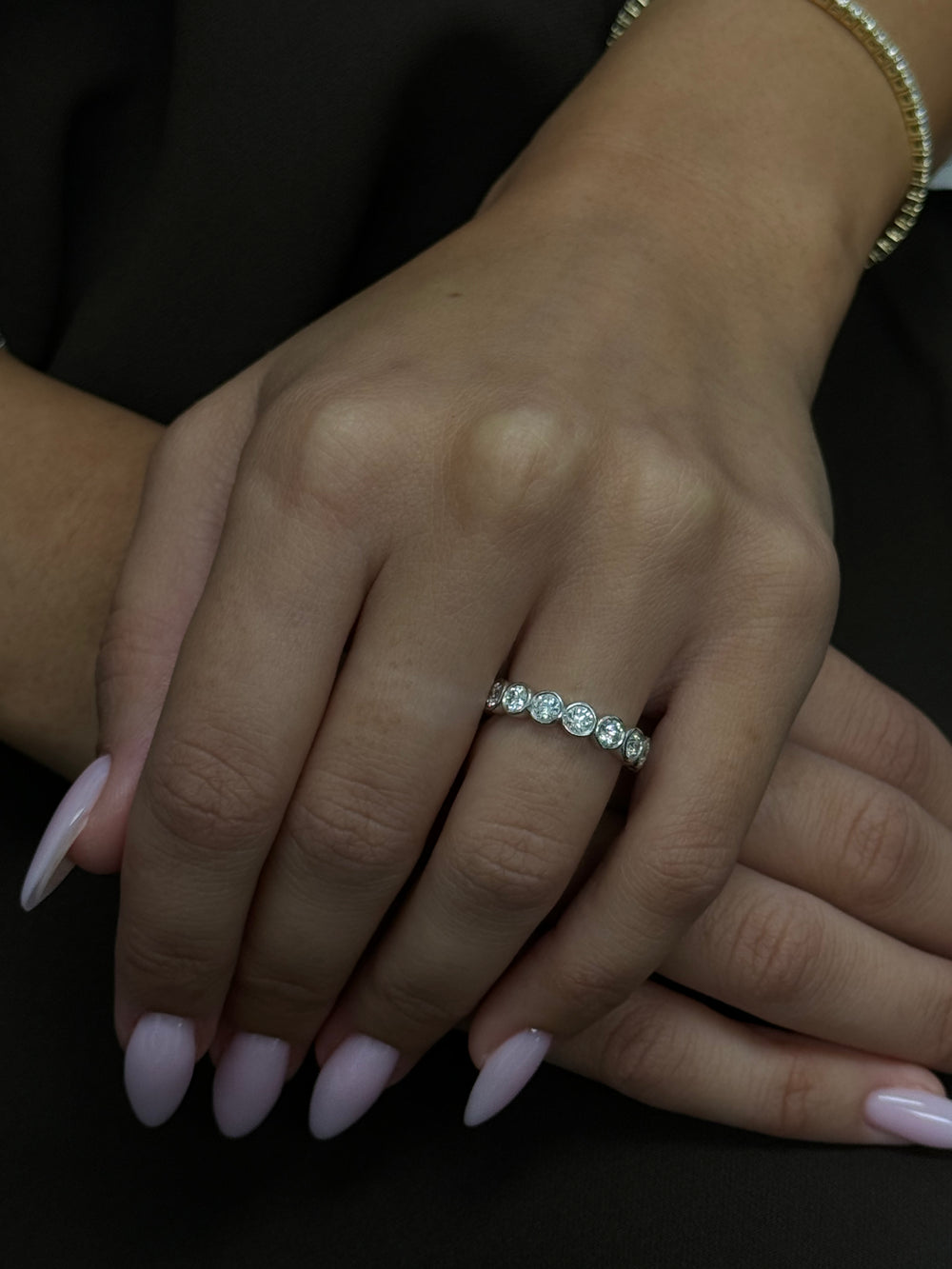 Bezel Set Round Cut Diamond Eternity Band, Model Hand