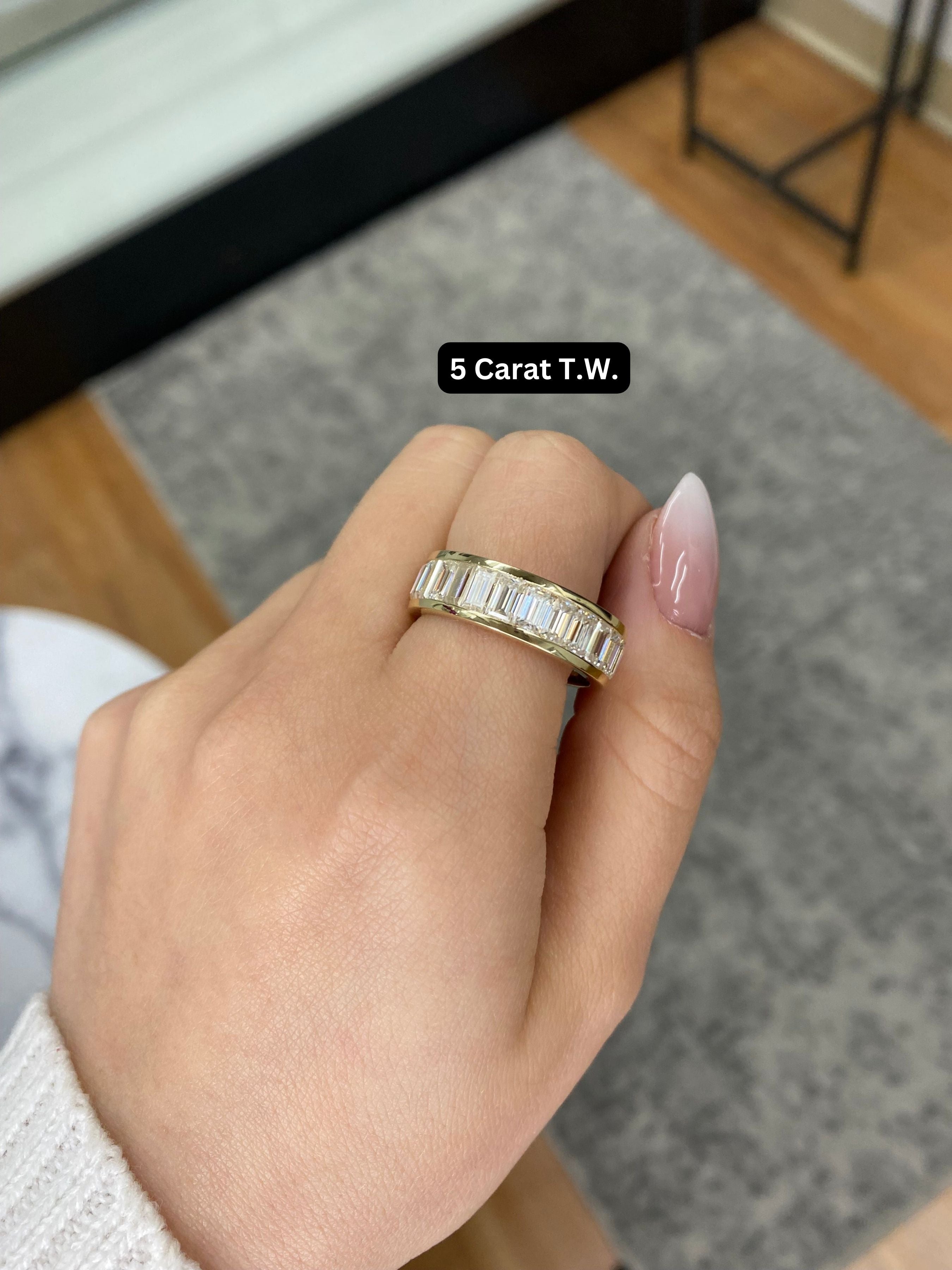 Channel set emerald cut store eternity band