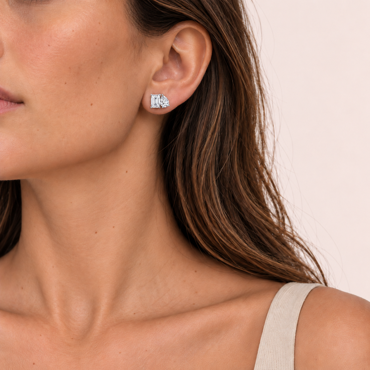 Emerald and Pear Shape Toi Et Moi Natural Diamond Studs lifestyle white