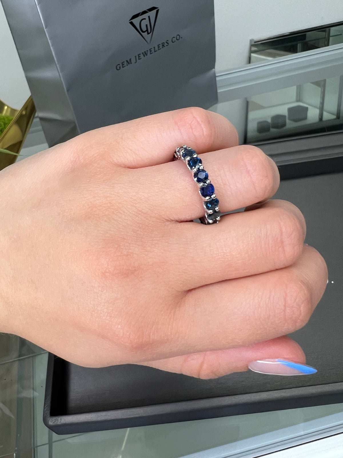  2ct-prong-setting-round-cut-blue-sapphire-eternity-band-14k-white-gold