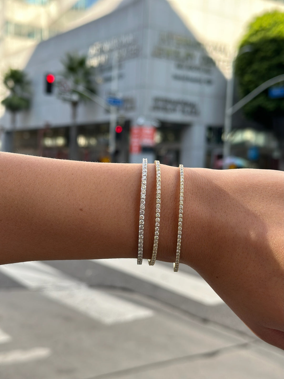flexible-diamond-bangles-in-14k-solid-gold-pictured-in-the-street-of-los-angeles