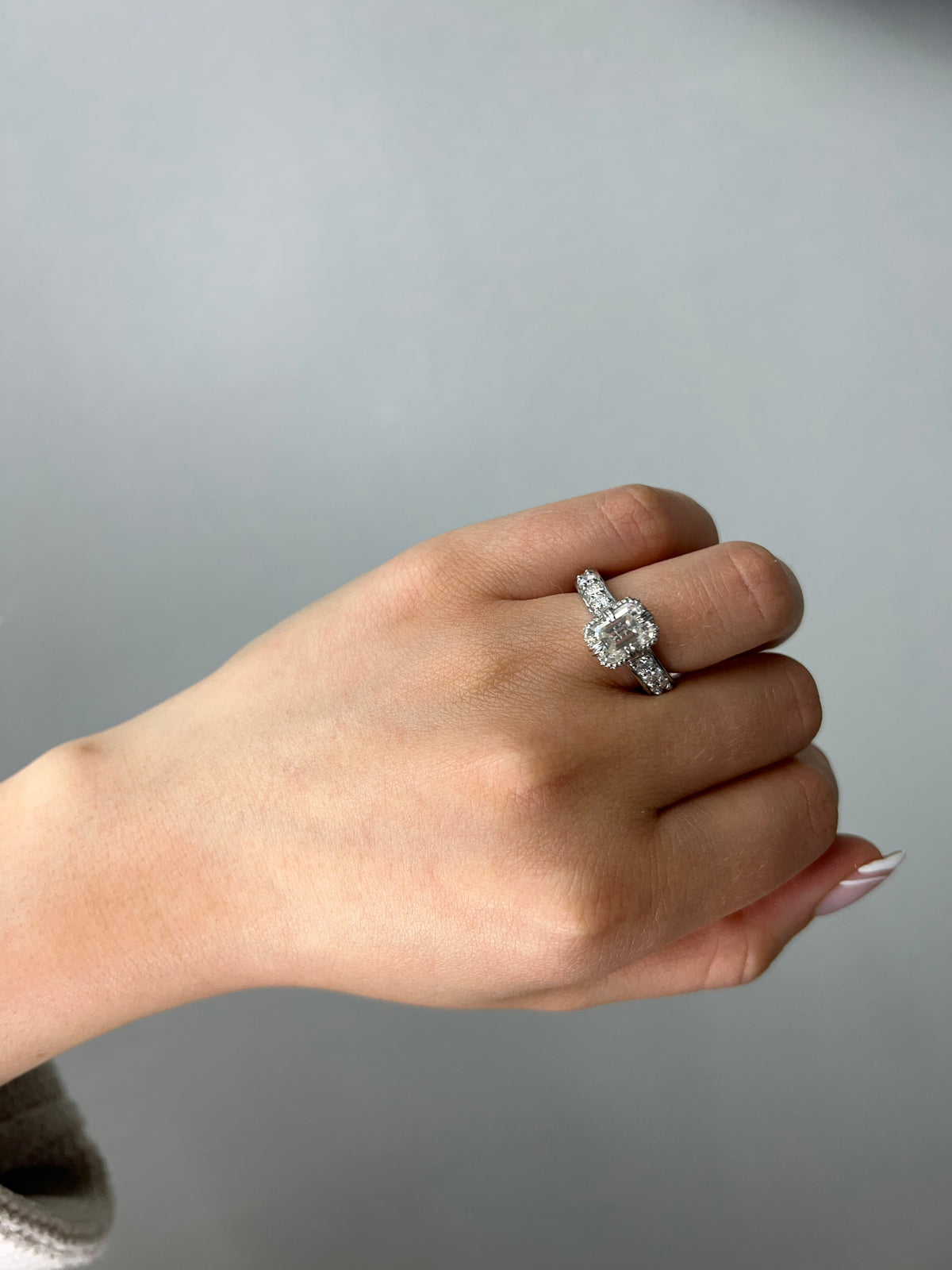 Bristol - Emerald Cut Diamond Engagement Ring with Side stones and Invisible Halo - Gem Jewelers Co