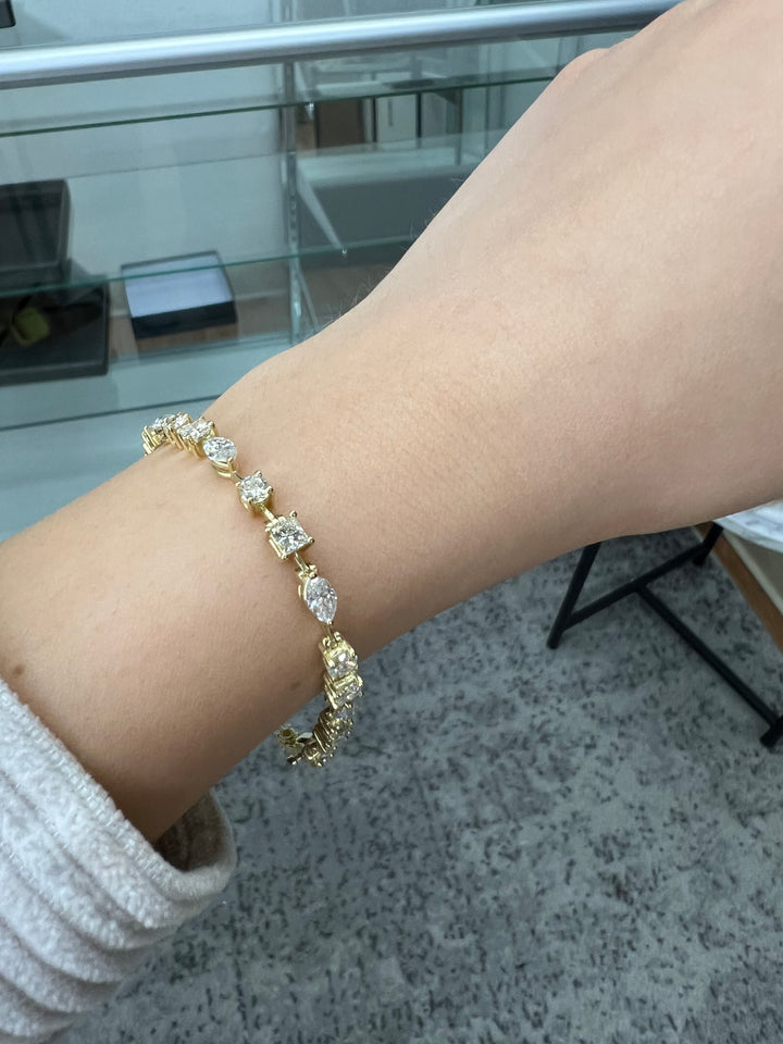 10.50-carat-total-weight-multi-shape-combo-diamond-tennis-bracelet-18k-yellow-gold