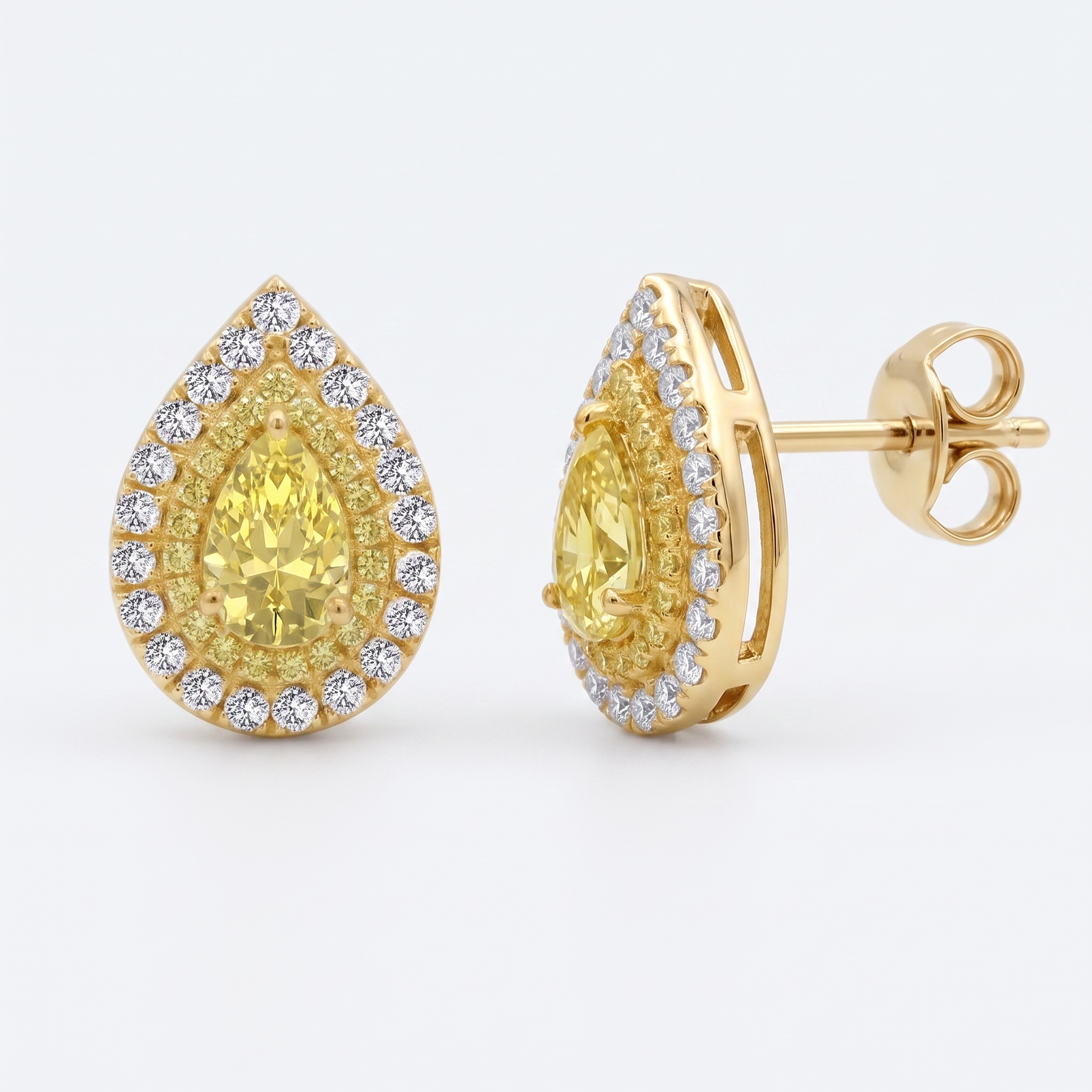 Pear Shape Natural Fancy Yellow Diamond Halo Studs YG
