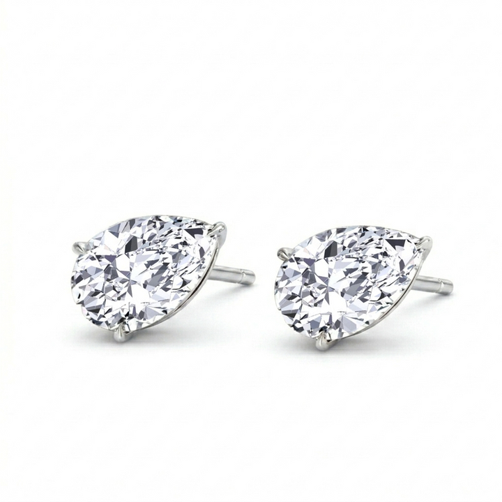 Pear Shaped East West Natural Diamond Studs WG