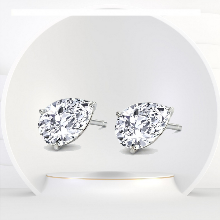 Pear Shaped East West Natural Diamond Studs WG