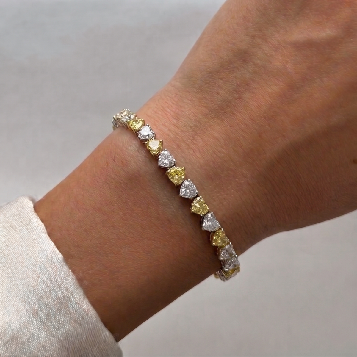 12CT T.W. Heart Shape Natural White and Fancy Yellow Diamond Two-Tone Tennis Bracelet