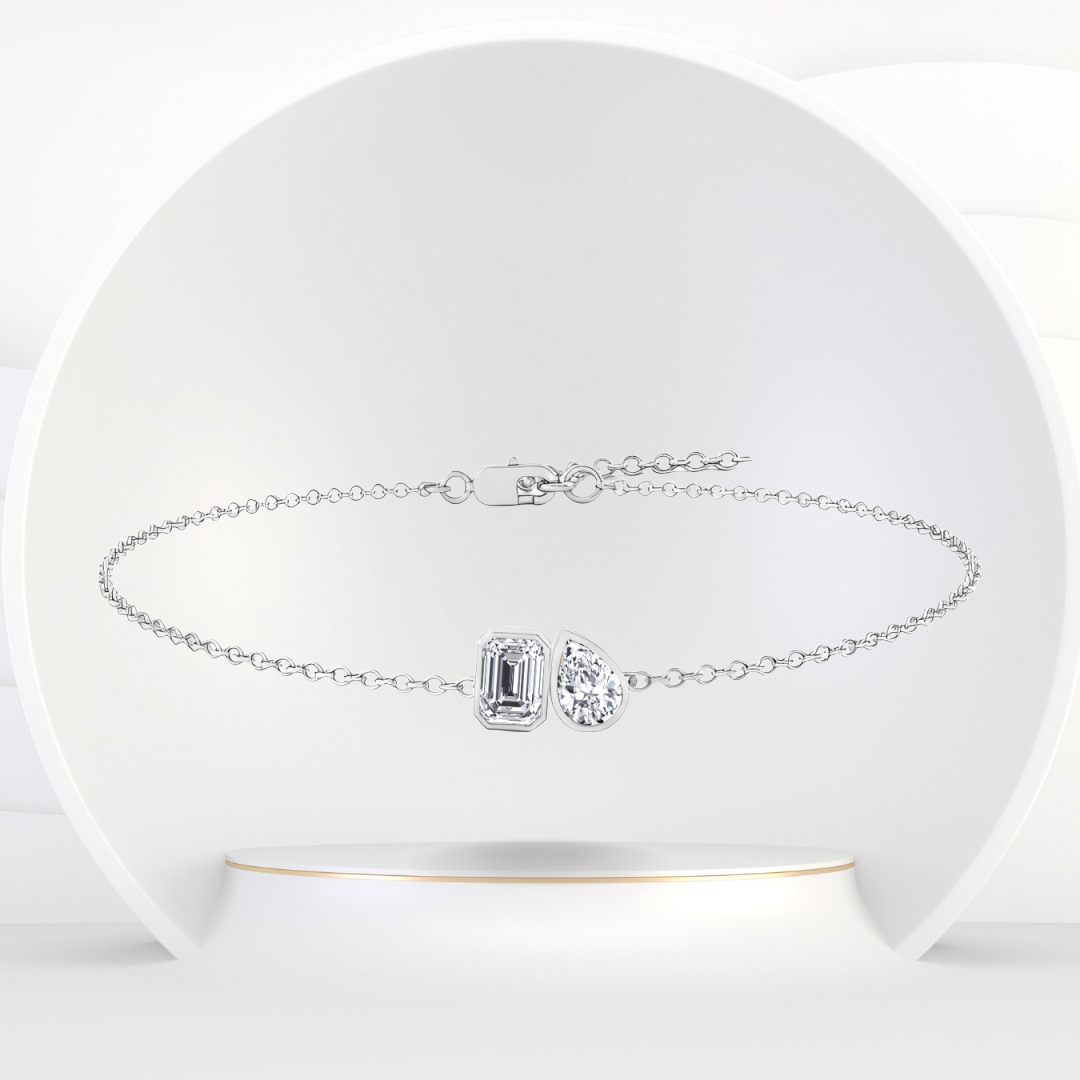 WG Toi Et Moi Emerald & Pear Shape Diamond Bracelet front view