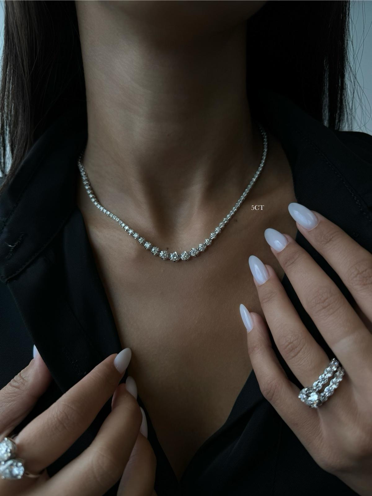 Gold diamond necklace on display