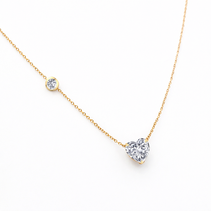 YG Heart Shape With Round Side Stone Natural Diamond Pendant slight side view