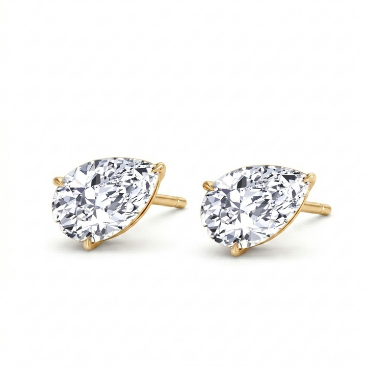 Pear Shaped East West Natural Diamond Studs YG