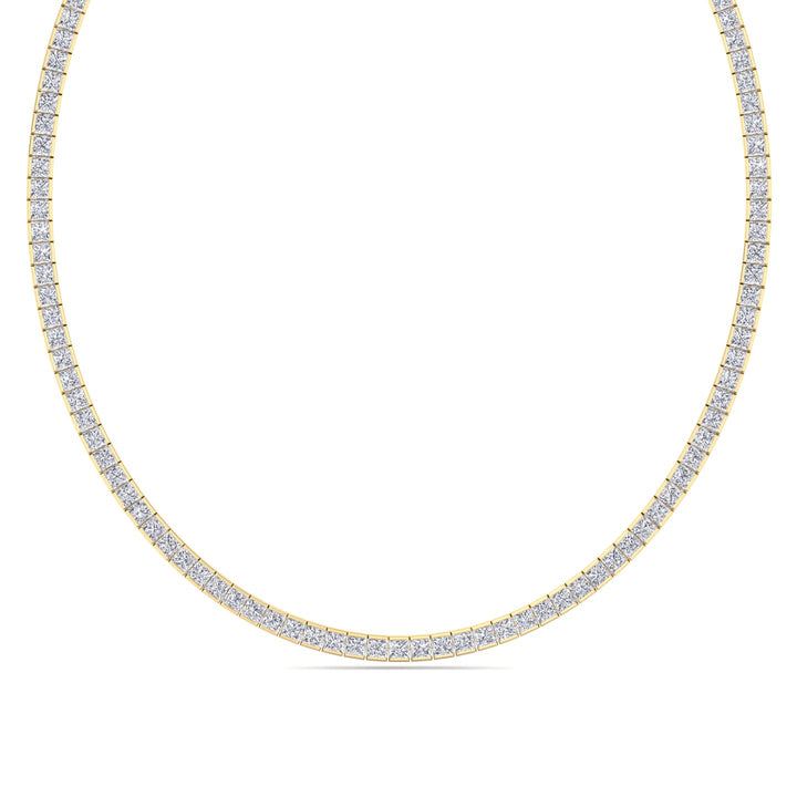 Gold necklace with diamonds on a white background