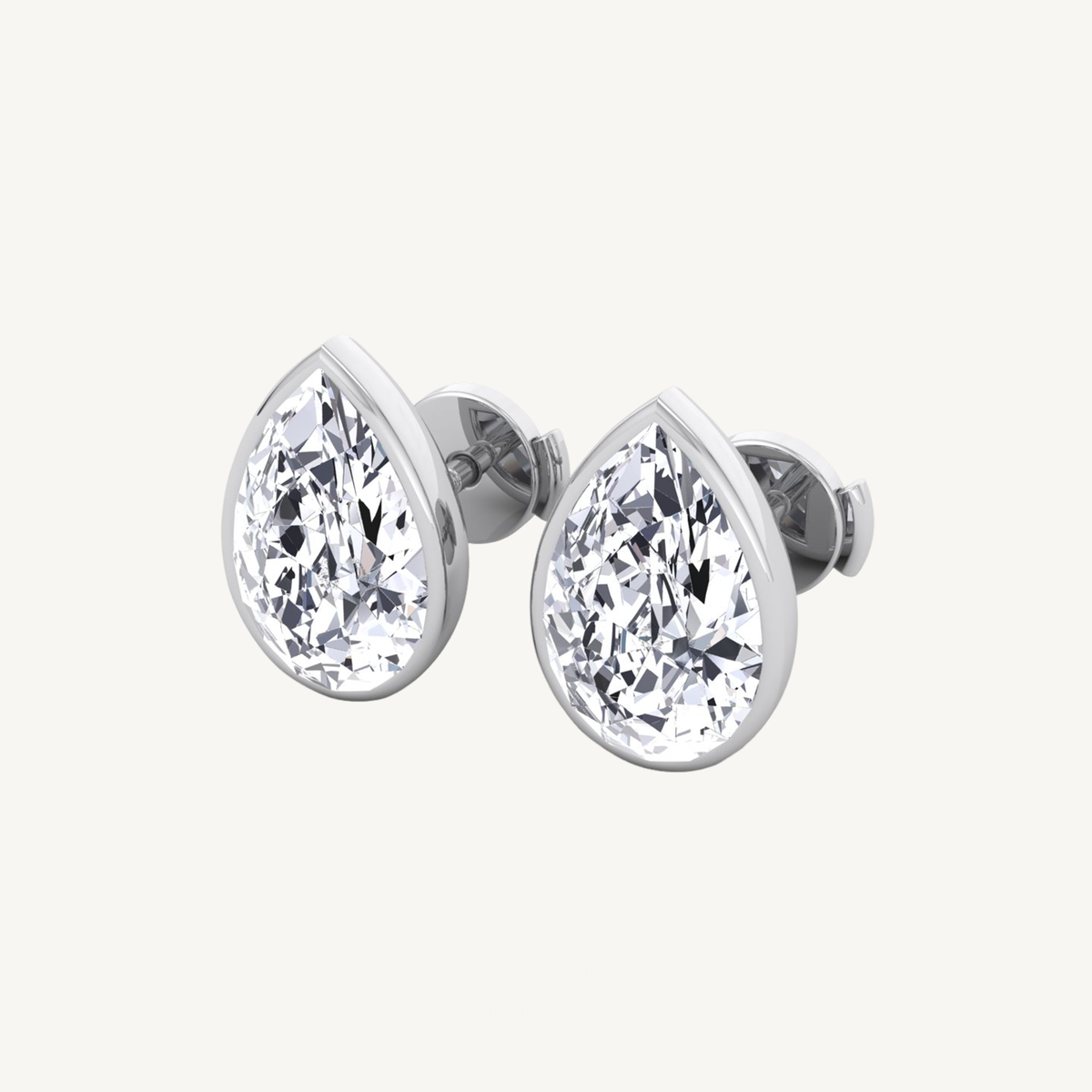 Bezel Set Pear Shape Natural Diamond Studs