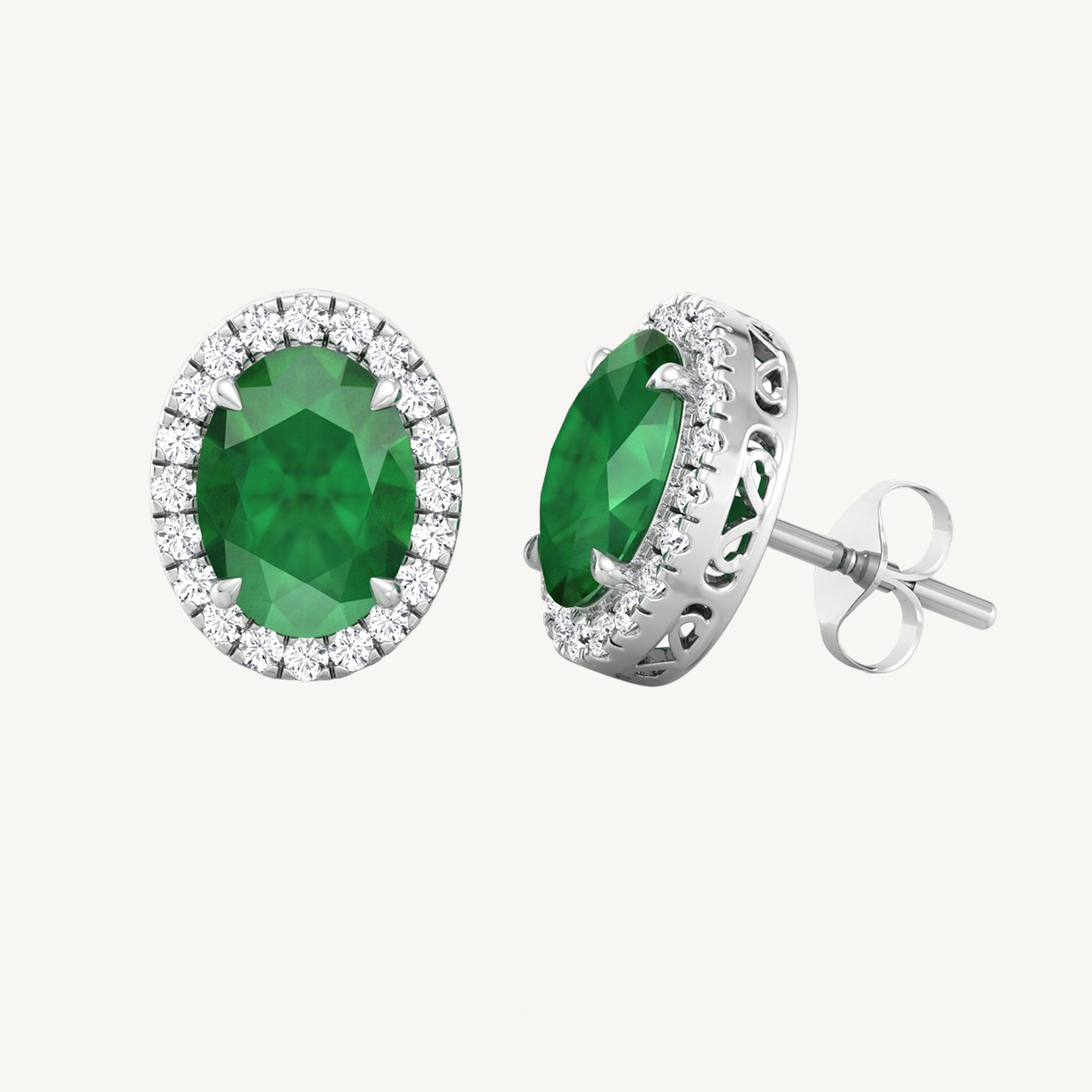 Oval Cut Emerald and Diamond Halo Earrings