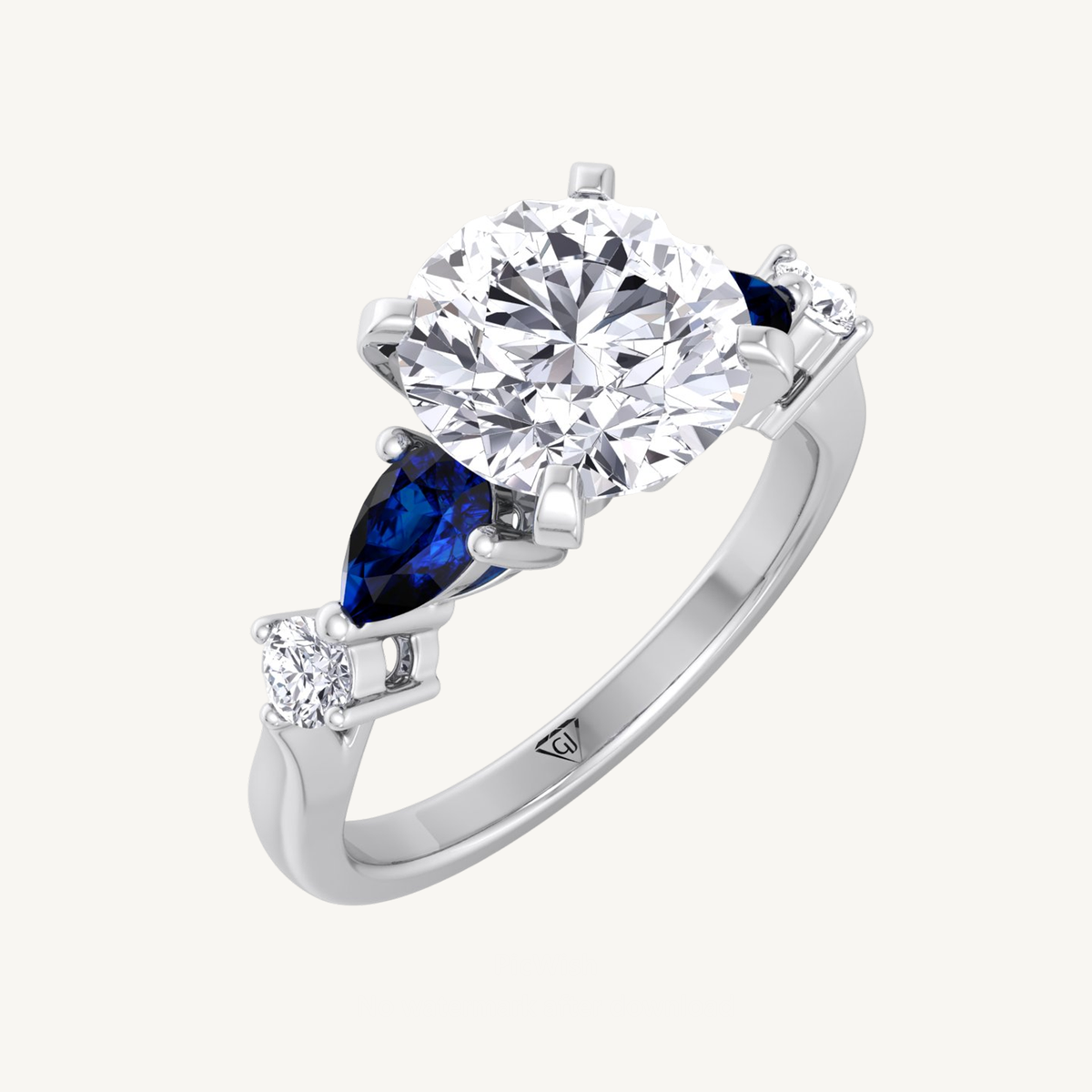 (2.57Ct T.W.) Round Cut Diamond Engagement Ring with Blue Sapphire Pear Shape Sidestones
