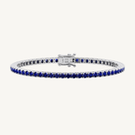 4-prong natural blue sapphire tennis bracelet 14K gold