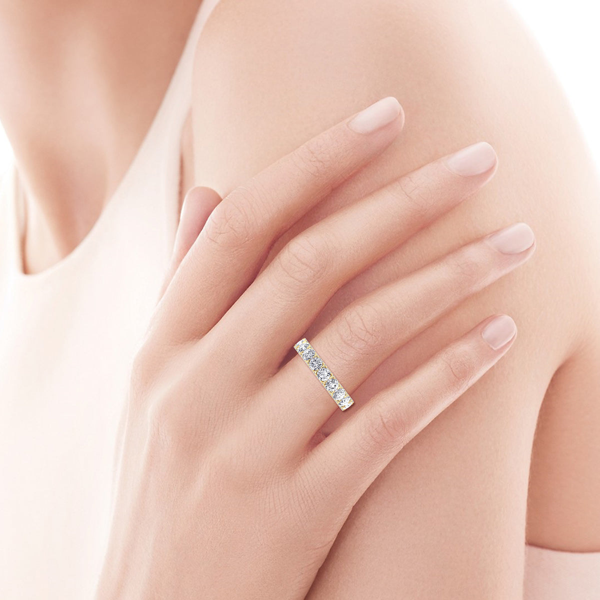 hidden-halo-round-diamond-eternity-band-in-yellow-gold