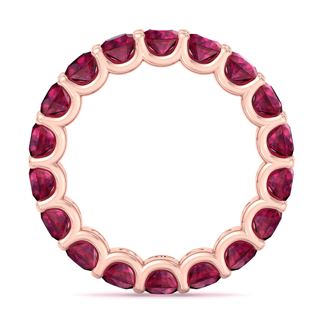 round-cut-ruby-eternity-band-in-rose-gold
