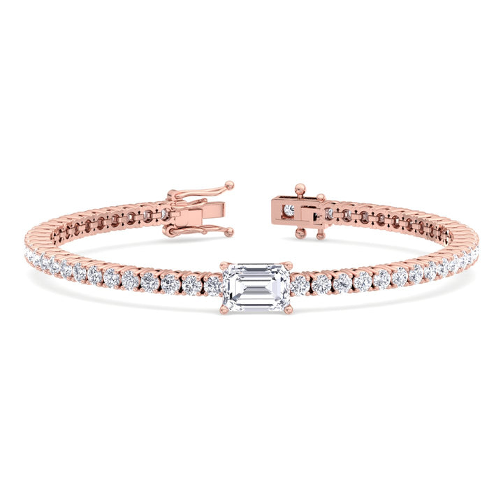 emerald-cut-center-stone-diamond-tennis-bracelet-in-solid-rose-gold
