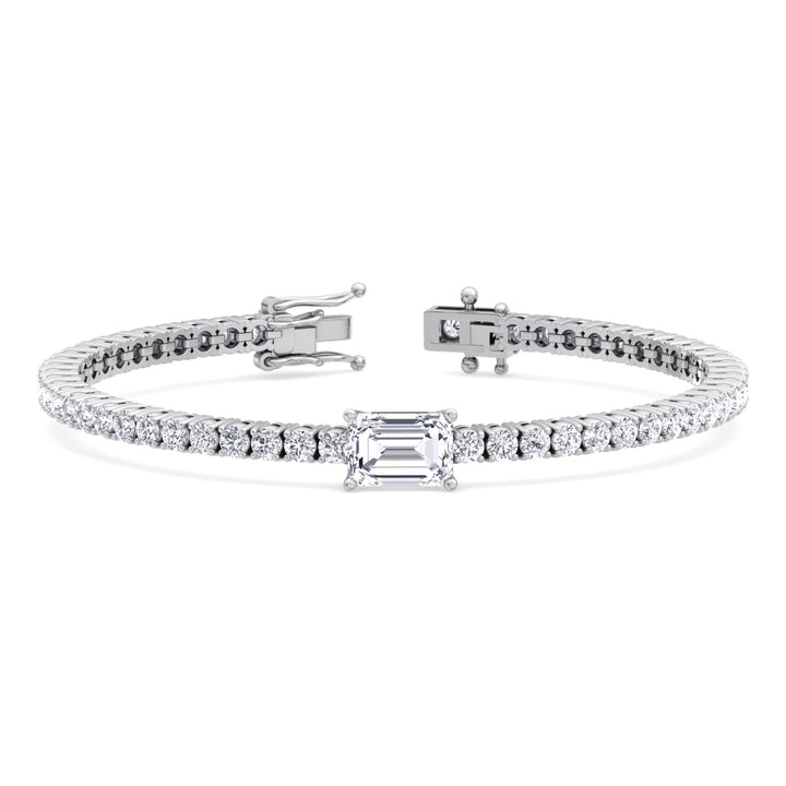 emerald-cut-center-stone-diamond-tennis-bracelet-solid-white-gold