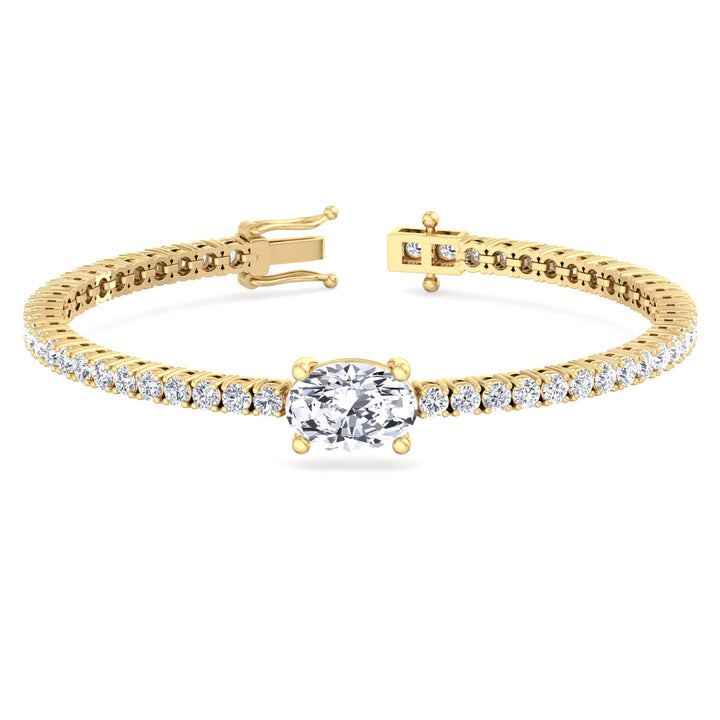 oval-cut-center-stone-diamond-tennis-bracelet-in-solid-14k-yellow-gold