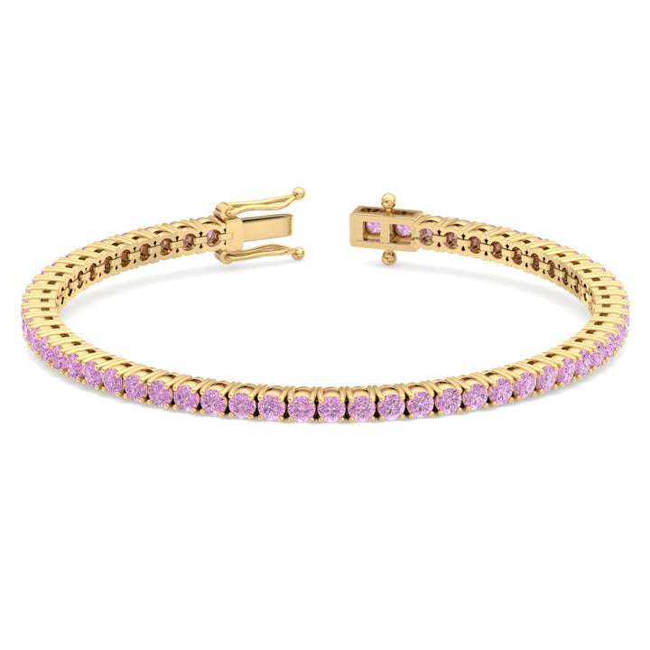 round-cut-pink-sapphire-tennis-bracelet-yellow-gold