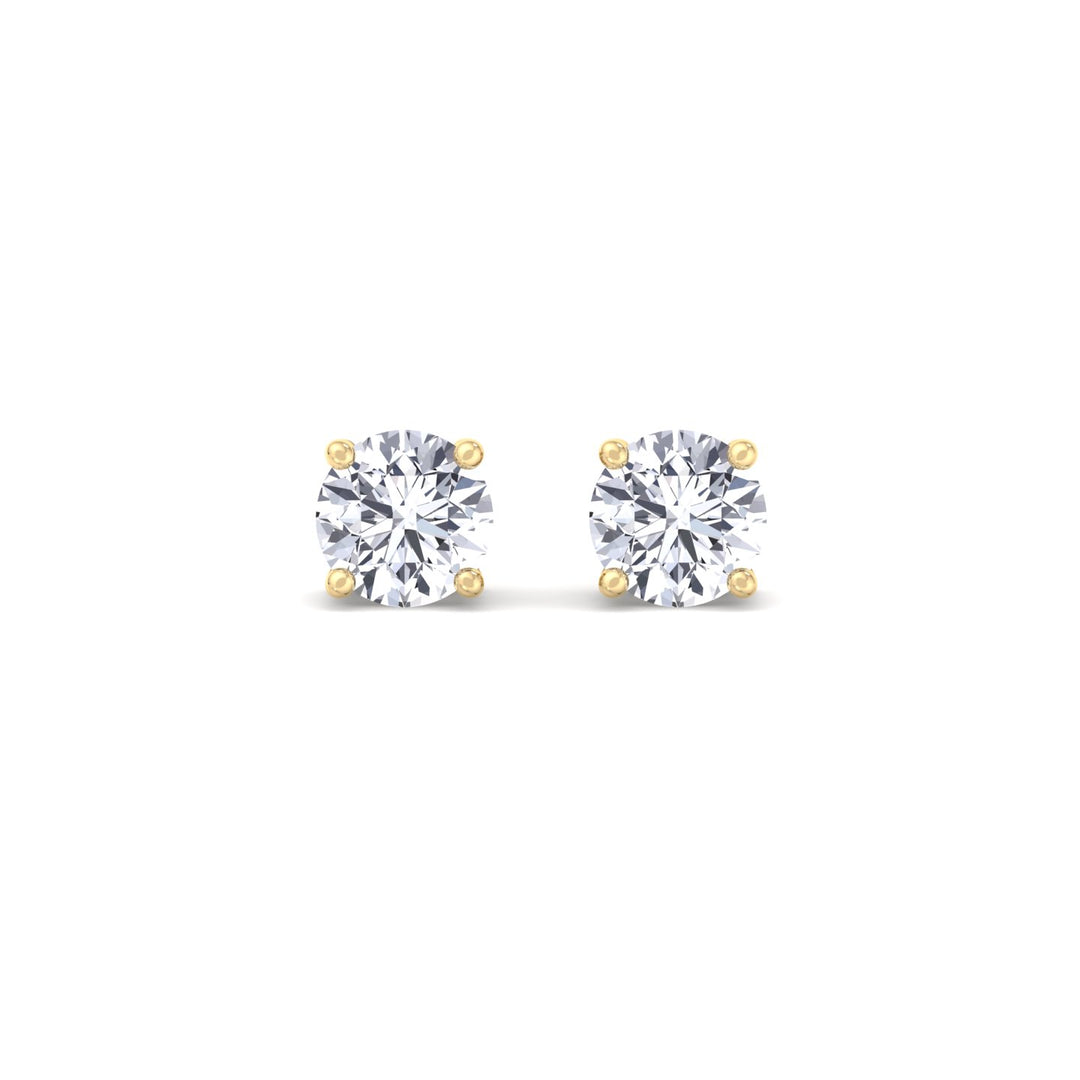 round-diamond-stud-earrings-in-yellow-gold