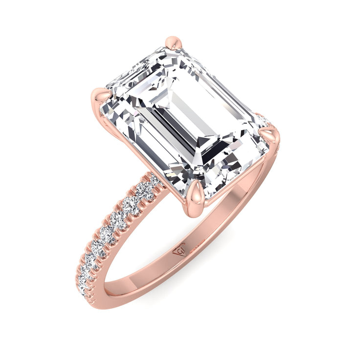 emerald-cut-diamond-engagement-ring-with-round-sidestones-in-solid-rose-gold
