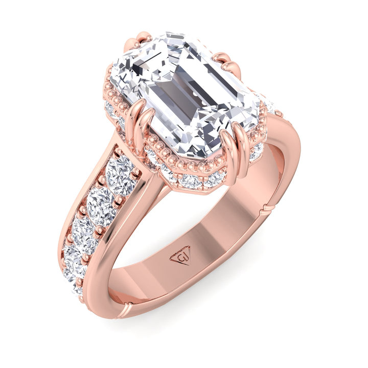 emerald-engagement-ring-with-side-stones-and-invisible-halo-in-solid-rose-gold 