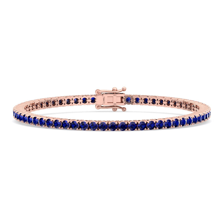 round-cut-blue-sapphire-tennis-bracelet-in-14k-rose-gold