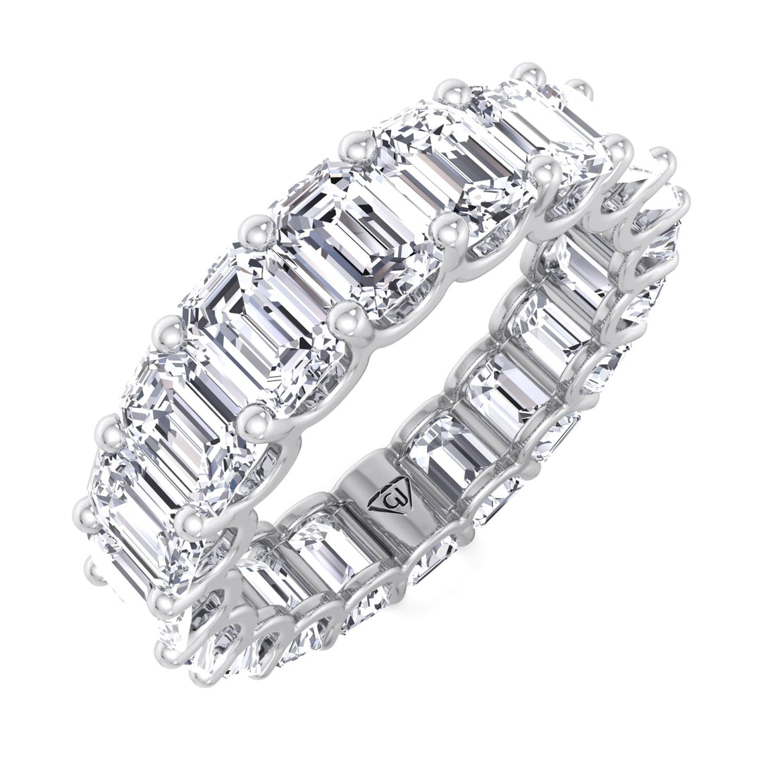 U-prong-emerald-cut-diamond-eternity-band-in-solid-white-gold