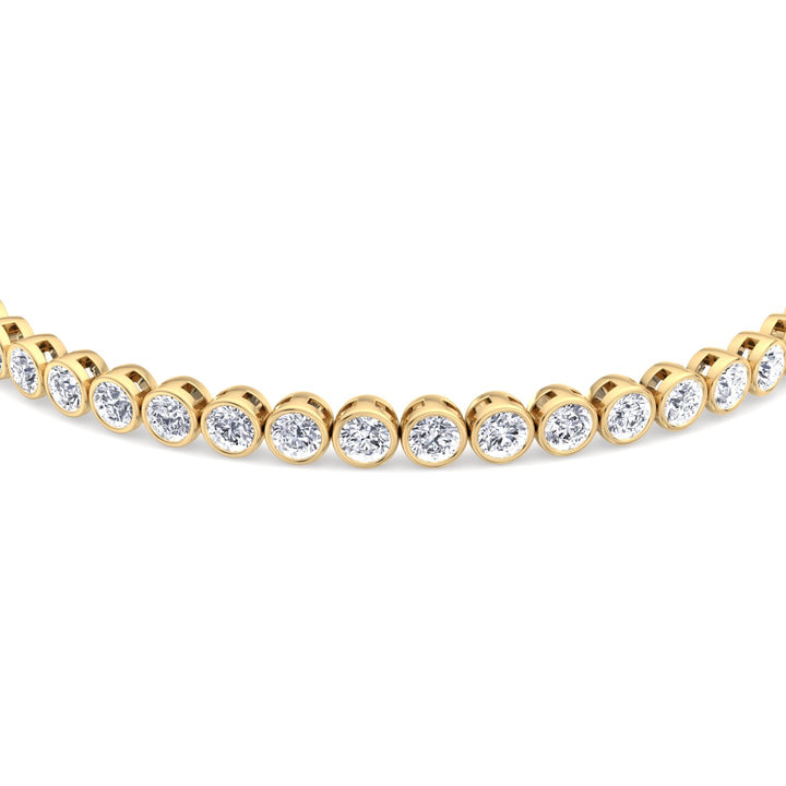 round-cut-bezel-set-diamond-tennis-bracelet-solid-yellow-gold