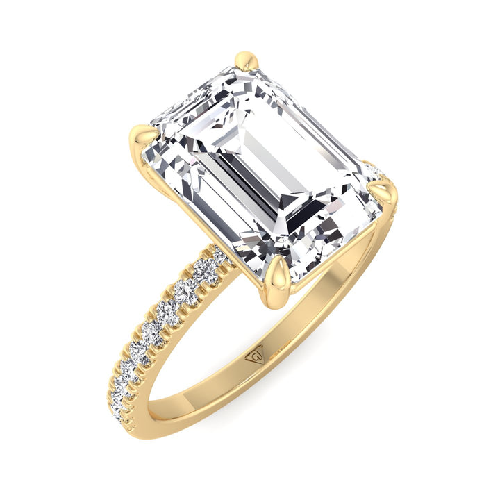 emerald-cut-diamond-engagement-ring-with-round-sidestones-in-solid-yellow-gold