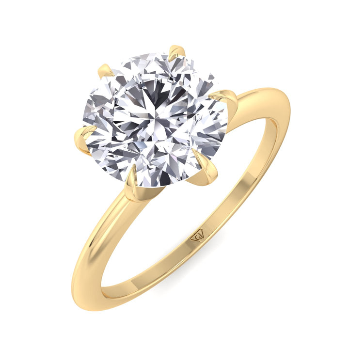 round-cut-solitaire-diamond-engagement-ring-in-solid-yellow-gold