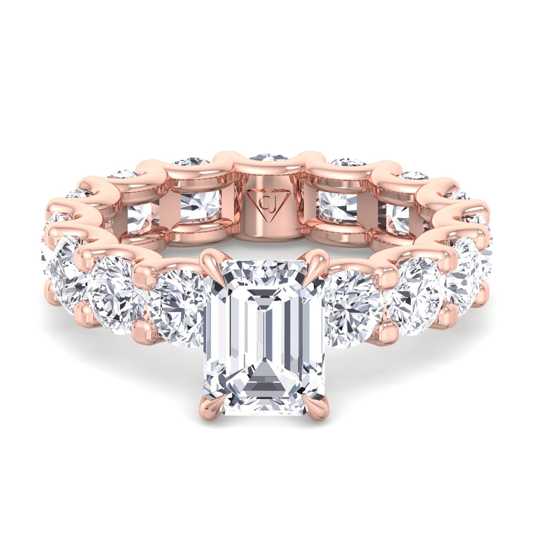 emerald-cut-diamond-eternity-ring-with-round-side-stones-solid-rose-gold