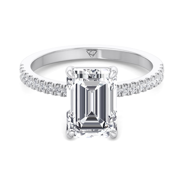 emerald-cut-diamond-engagement-ring-with-round-sidestones-in-white-gold