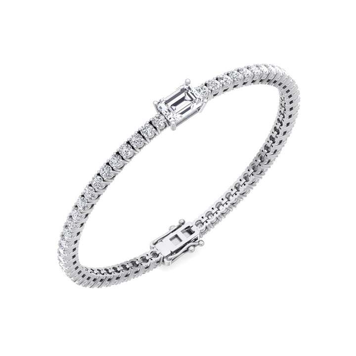 emerald-cut-center-stone-diamond-tennis-bracelet-in-solid-white-gold